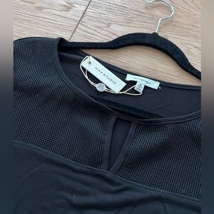 NWT black long top with cut out and mesh detail